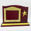 Decorative plaque with gold frame and star on a red background, featuring dimensions and price.